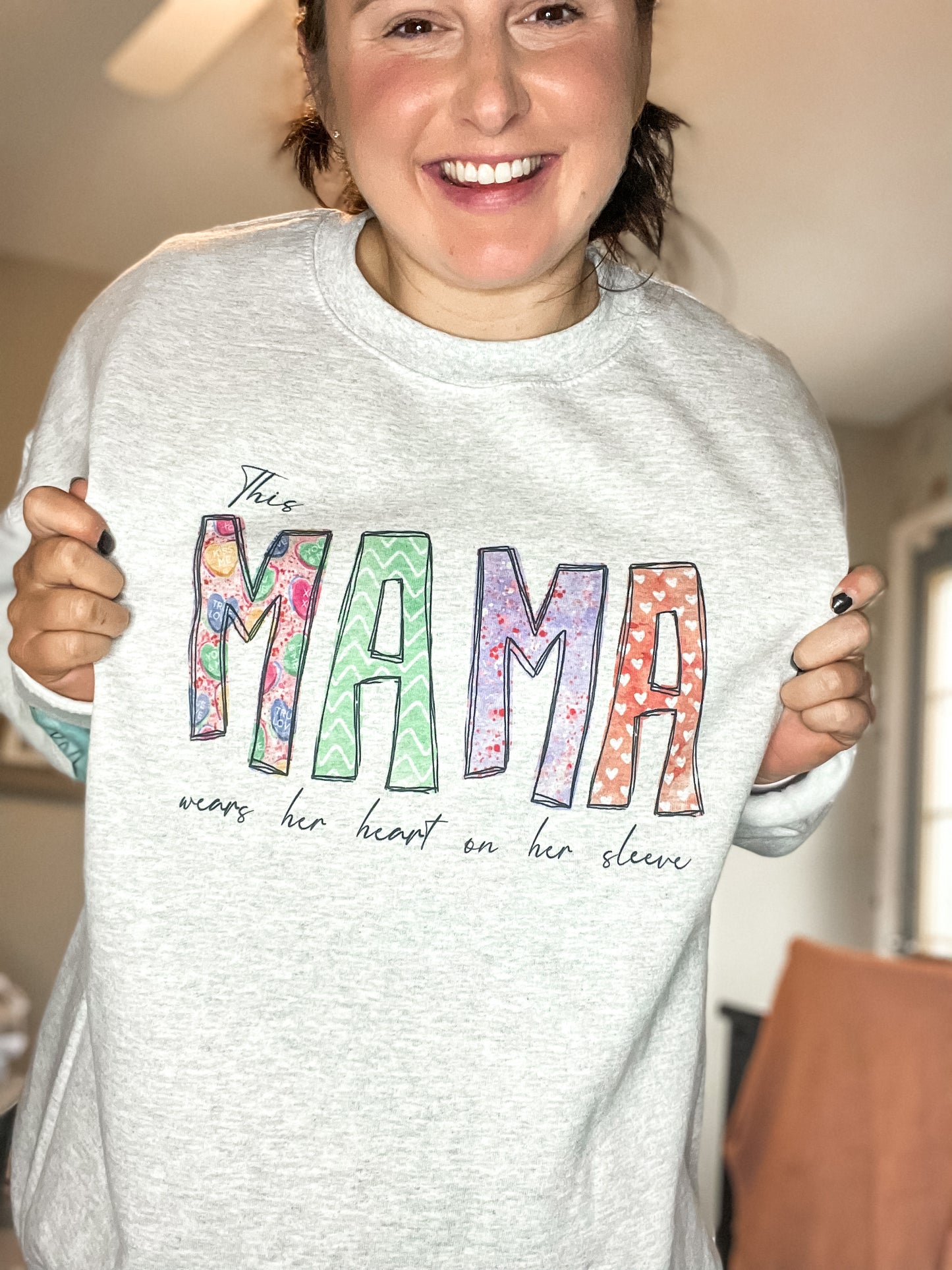 this "mama" wears her heart on her sleeves